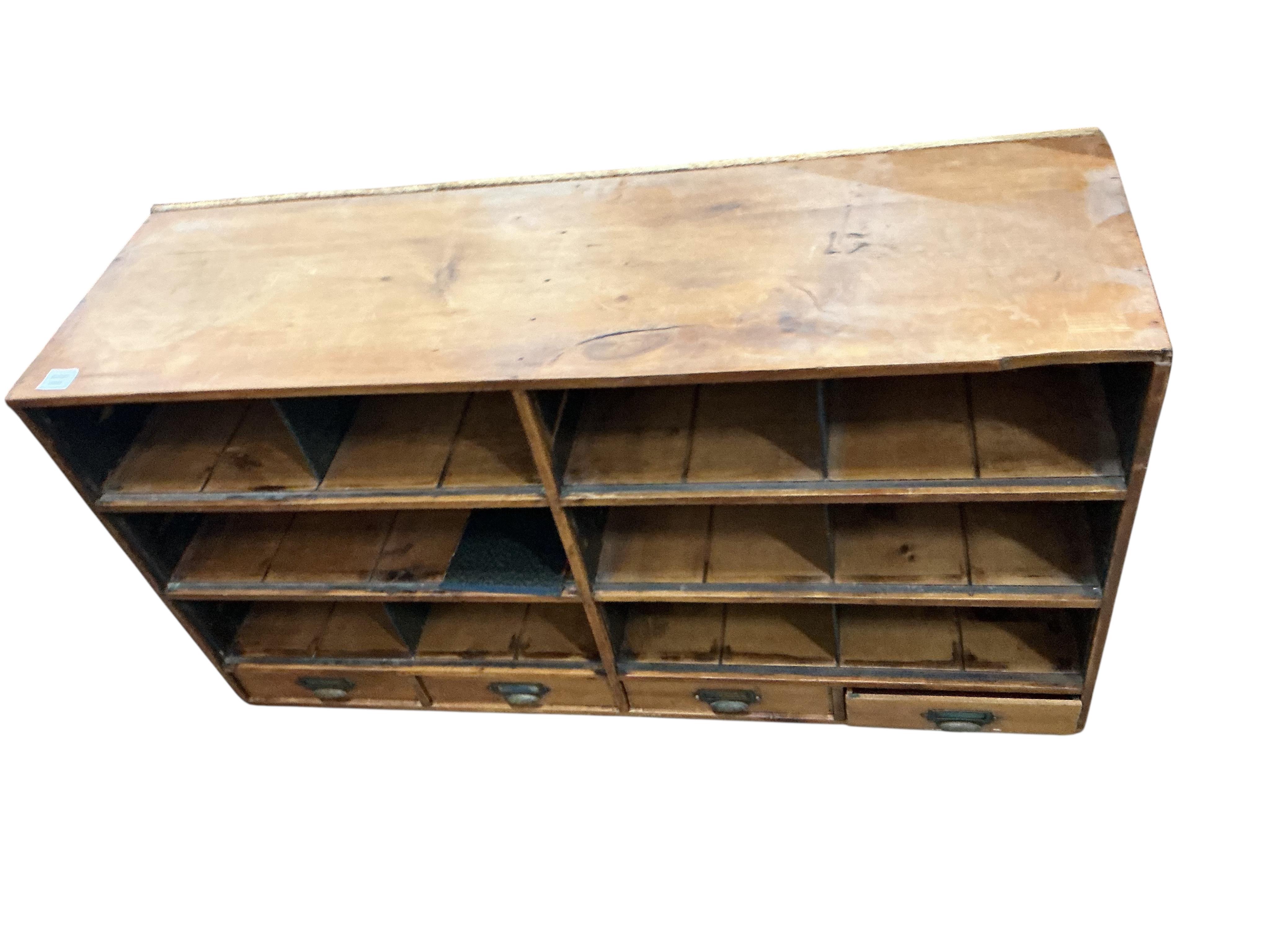 A mid century pine pigeonhole unit, width 121cm, depth 39cm, height 85cm